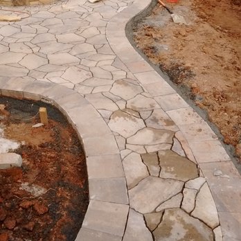 Artistic Yards - a stone patio being built - Landscaping Near Me - Atlanta, Georgia Artistic Yards - a stone patio being built - Landscaping Near Me - Atlanta, Georgia