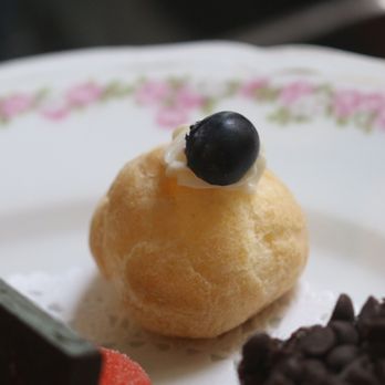 Quintealia's Tea Parlor - Creme puff with Devonshire cream and blueberry - Tea Rooms Near Me - Burton, Ohio Quintealia's Tea Parlor - Creme puff with Devonshire cream and blueberry - Tea Rooms Near Me - Burton, Ohio