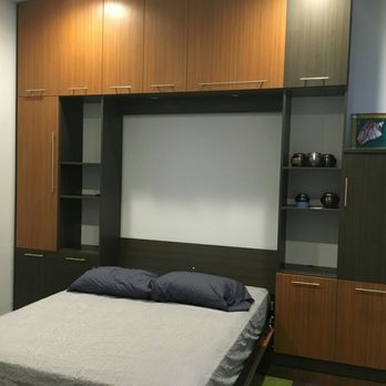 Murphy Wallbeds Chicago - Storage all around and reading lights above. It's built-in wall to wall. They even helped us work around the window which goes to the wall. - Furniture Stores Near Me - Glenview, Illinois Murphy Wallbeds Chicago - Storage all around and reading lights above. It's built-in wall to wall. They even helped us work around the window which goes to the wall. - Furniture Stores Near Me - Glenview, Illinois