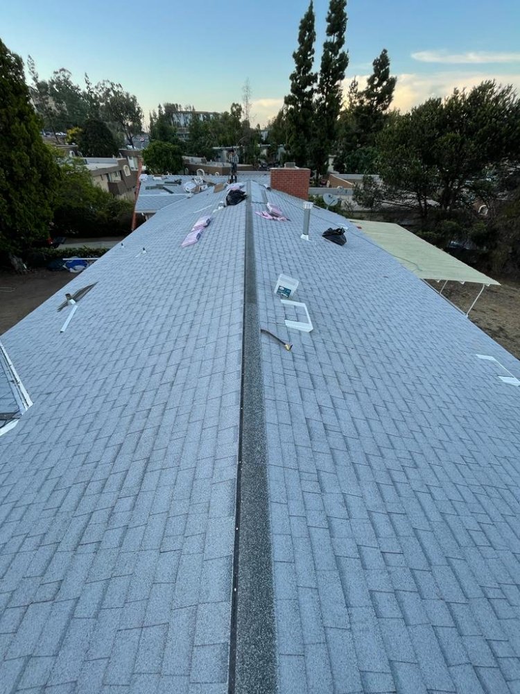 Slide of Alma Roofing