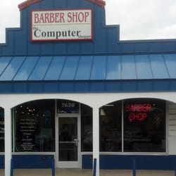 A Barber Shop - Located in the Portage Plaza