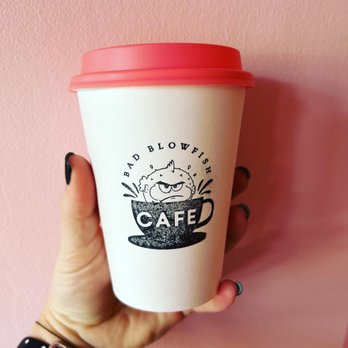 Bad Blowfish - a hand holding a cup of coffee - Cafes Near Me - Toronto, Ontario Bad Blowfish - a hand holding a cup of coffee - Cafes Near Me - Toronto, Ontario