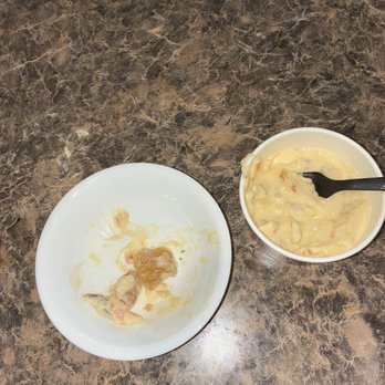Chipotle Mexican Grill - Side of Queso Blanco with contamination - Mexican Near Me - Olympia, Washington