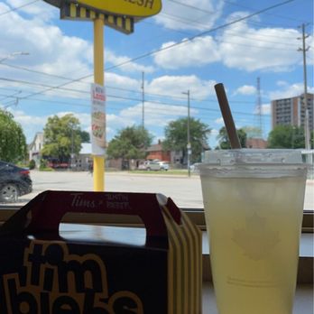 Tim Hortons - a drink and a sign for tim hortons - Bakeries Near Me - Windsor, Ontario Tim Hortons - a drink and a sign for tim hortons - Bakeries Near Me - Windsor, Ontario