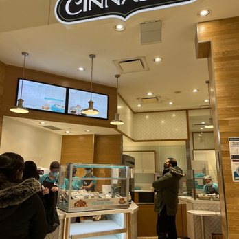 Cinnabon - a man standing in front of the counter - Bakeries Near Me - Oshawa, Ontario Cinnabon - a man standing in front of the counter - Bakeries Near Me - Oshawa, Ontario