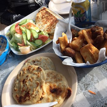 Restaurante Las San Sivar Pupusería - Pork, cheese, beans pupusas (front), chicken quesadillas with salad, fried yuca - Salvadoran Near Me - Toronto, Ontario Restaurante Las San Sivar Pupusería - Pork, cheese, beans pupusas (front), chicken quesadillas with salad, fried yuca - Salvadoran Near Me - Toronto, Ontario
