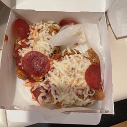 KFC - $11 chicken pizza.