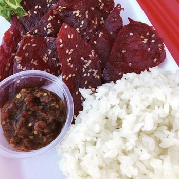 Sticky Rice on Wheels - The number 3 beef jerky/heavenly beef. The jerky itself isn't spicy. The spice comes from the chili chutney that comes ON THE SIDE - Food Trucks Near Me - Fresno, California Sticky Rice on Wheels - The number 3 beef jerky/heavenly beef. The jerky itself isn't spicy. The spice comes from the chili chutney that comes ON THE SIDE - Food Trucks Near Me - Fresno, California