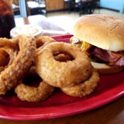Ralphie's Sports Eatery - Onion rings (good!) and the disappointing chipotle BBQ bacon cheddar burger (overcooked, dry, nearly flavourless).