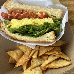 a sandwich and chips a sandwich and chips