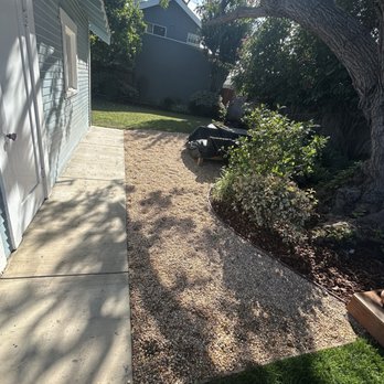 Christine Nakov - Decorative stone lounge space - Landscaping Near Me