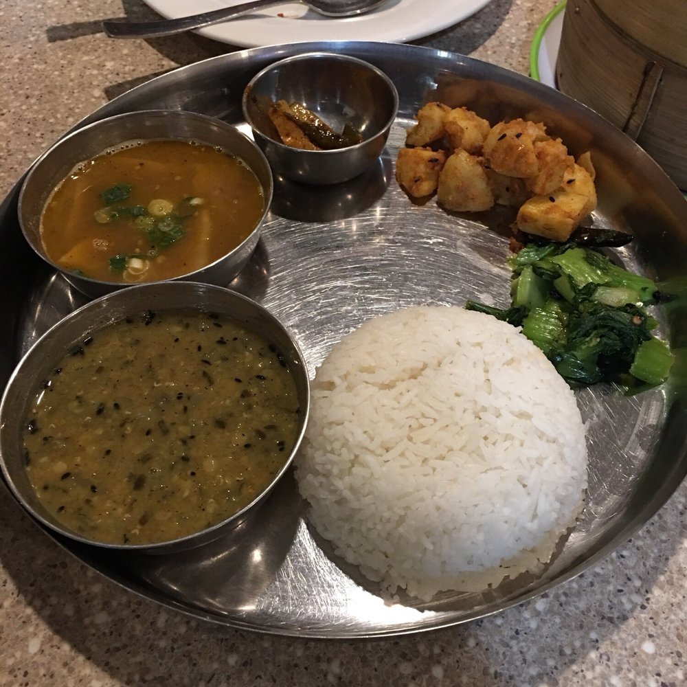 Karma's Kitchen - NT1. Nepali veggie thali (the lentil soup in bottom left corner is to die for) - Himalayan/Nepalese Near Me - Toronto, Ontario Karma's Kitchen - NT1. Nepali veggie thali (the lentil soup in bottom left corner is to die for) - Himalayan/Nepalese Near Me - Toronto, Ontario