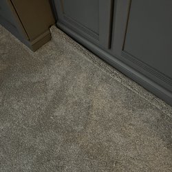 Lewis Floor & Home - Carpeted in Murphy bed.