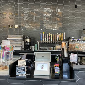 Karmic Grounds - a coffee shop counter - Coffee & Tea Near Me - Frisco, Texas Karmic Grounds - a coffee shop counter - Coffee & Tea Near Me - Frisco, Texas