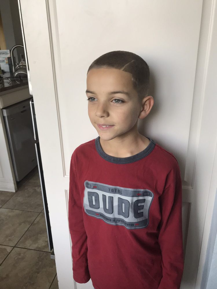 Unashamed Cuts Barber Shop Logo