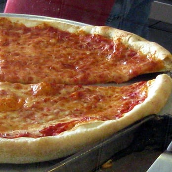 Rizzo's Pizza - a pizza with a slice taken out of it - Pizza Near Me - Ocean Township, New Jersey