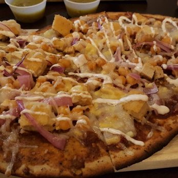 Vegan Cave Cafe - Buffalo Buddha on nutty almond crust - Pizza Near Me - Vancouver, British Columbia