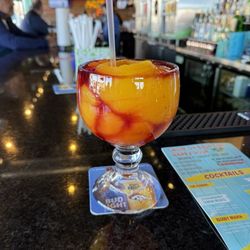 Fuzzy's Taco Shop - Sangria swirl with frozen mango