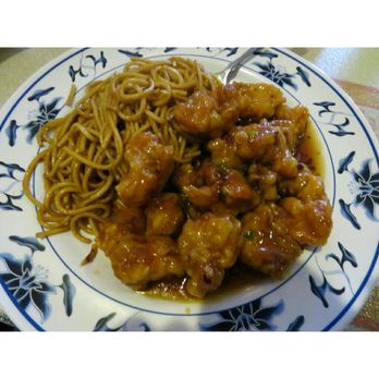 China Doll Restaurant - Orange chicken with lo mein & no veggies. - Chinese Near Me - Houston, Texas China Doll Restaurant - Orange chicken with lo mein & no veggies. - Chinese Near Me - Houston, Texas