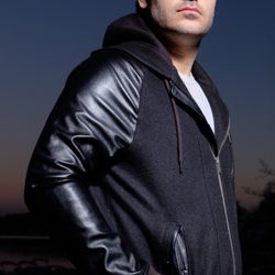 Enspire Photography - This is an on location portrait that I did for a friend, using a silver parabolic umbrella and speedlight. Model- Kevin Kojouri