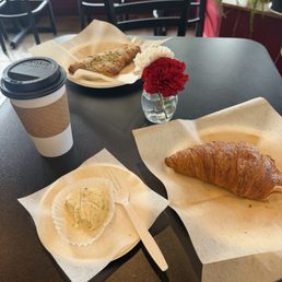 Matcha Latte, egg & cheese bite, regular croissant, & an almond honey croissant