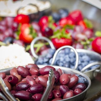 Gerard's Paella - Beautiful, simple, & delicious appetizers (paella pan FULL of fruit, olives, cheese, & crackers www.shannoncaseyphotography.com - Caterers Near Me