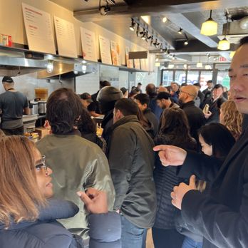 Dos Toros Taqueria - Dos Toros customers standing shoulder to shoulder waiting for orders! - Mexican Near Me - New York, New York Dos Toros Taqueria - Dos Toros customers standing shoulder to shoulder waiting for orders! - Mexican Near Me - New York, New York