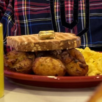 The Hangout - Two scrambled eggs, fried small, whole potatoes, and toast. - Breakfast & Brunch Near Me - Walnut Creek, California The Hangout - Two scrambled eggs, fried small, whole potatoes, and toast. - Breakfast & Brunch Near Me - Walnut Creek, California