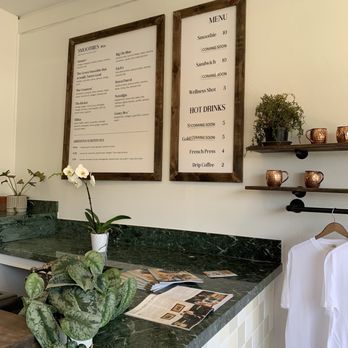 Edenic Smoothies - a counter with a menu on it - Juice Bars & Smoothies Near Me - Ventura, California