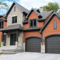 Aztech Doors & Windows - New construction house with new doors and windows