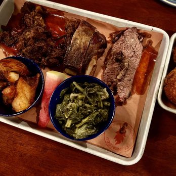 Reunion BBQ - 3 meat tray: prime brisket, dry rub pork ribs, sliced prime brisket, collared greens, and potatoes. Fried Mac and cheese bites. - Barbeque Near Me - Boston, Massachusetts Reunion BBQ - 3 meat tray: prime brisket, dry rub pork ribs, sliced prime brisket, collared greens, and potatoes. Fried Mac and cheese bites. - Barbeque Near Me - Boston, Massachusetts
