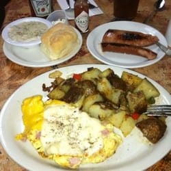 Ham n cheese omlette, home fries, biscuit and sasuage gravy and a kilbasa.