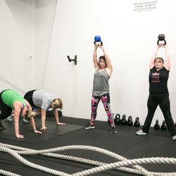 Limitless Fitness - Kbell Swings and Slider Mountain Climbers!