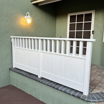 California Building and Remodeling - New railing after repairing front entry way that was leaking water into crawl space - General Contractors Near Me