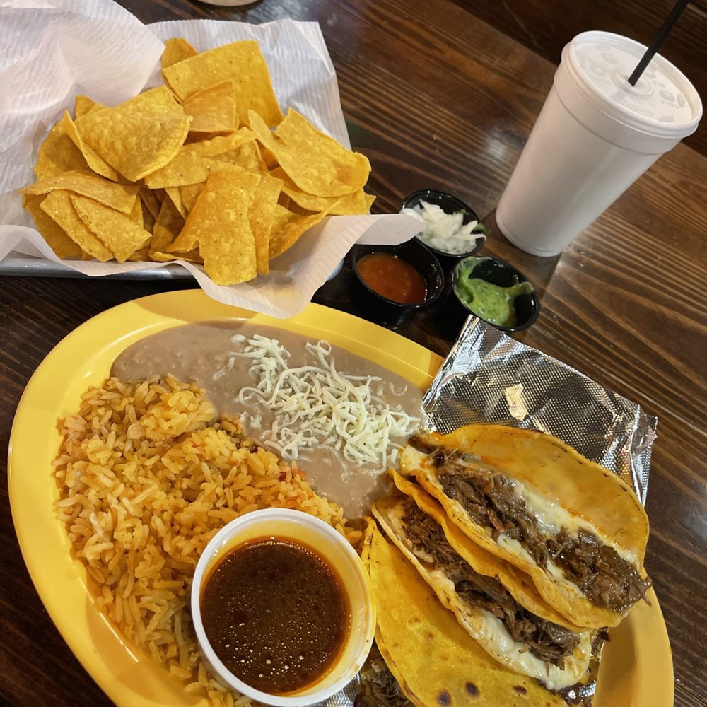 a plate of tacos and chips a plate of tacos and chips