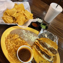 a plate of tacos and chips a plate of tacos and chips