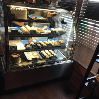 Cakes by B's Blue House Bakery - Deliciousness!  See the eclairs in there? - Coffee & Tea Near Me - Jamestown, North Carolina