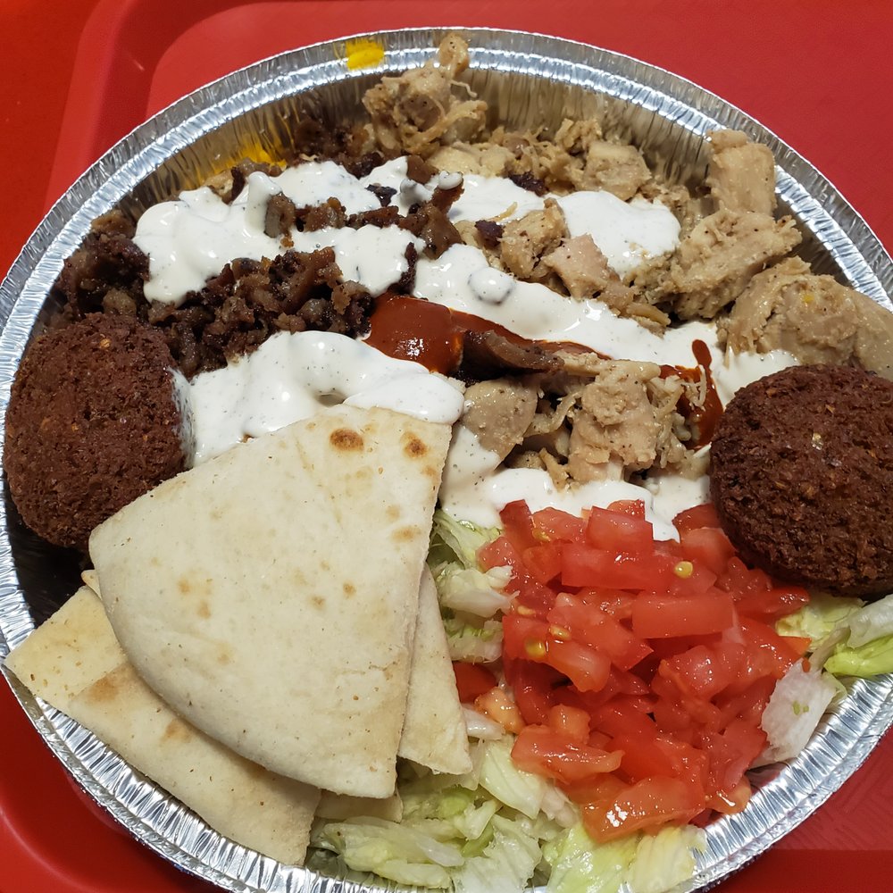 Gyro and chicken combo bowl. Falafels are extra. Gyro and chicken combo bowl. Falafels are extra.