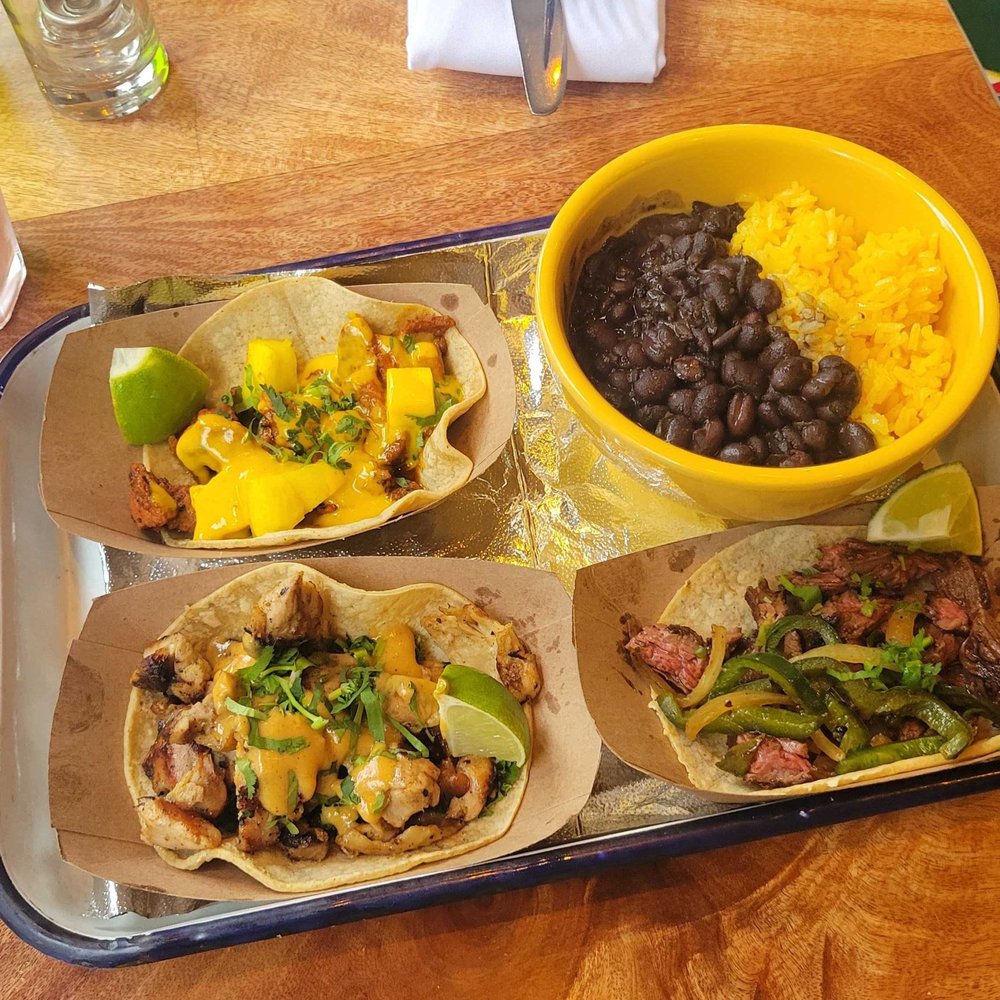 Playa Betty’s - Taco dinner - comes with a side of yellow rice and black beans. - Mexican Near Me - New York, New York Playa Betty’s - Taco dinner - comes with a side of yellow rice and black beans. - Mexican Near Me - New York, New York