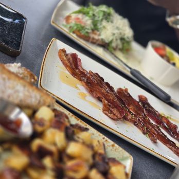First Watch - Million Dollar Bacon, Traditional breakfast, Parmesan Prosciutto Toast w/Egg Whites, Seasoned Potatoes, Toast with jam - Breakfast & Brunch Near Me - Cypress, Texas First Watch - Million Dollar Bacon, Traditional breakfast, Parmesan Prosciutto Toast w/Egg Whites, Seasoned Potatoes, Toast with jam - Breakfast & Brunch Near Me - Cypress, Texas