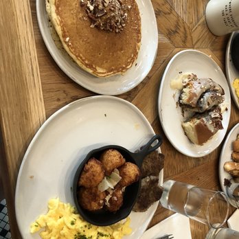 Magnolia Table - Pancakes, eggs, sausage, tator tots and the pecan cinnamon roll. - Breakfast & Brunch Near Me - Waco, Texas Magnolia Table - Pancakes, eggs, sausage, tator tots and the pecan cinnamon roll. - Breakfast & Brunch Near Me - Waco, Texas