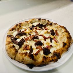 Mika’s Neapolitan Pizza - CYO pizza andouille sausage with short rib and gouda cheese