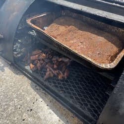 Big Time House of Ribs - Slow-smoked, tender Brisket (top);  chicken wings (bottom.)