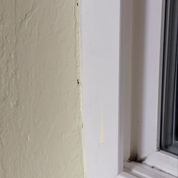 NW Paint Revival - Paint drips on the window frame - Painters Near Me NW Paint Revival - Paint drips on the window frame - Painters Near Me