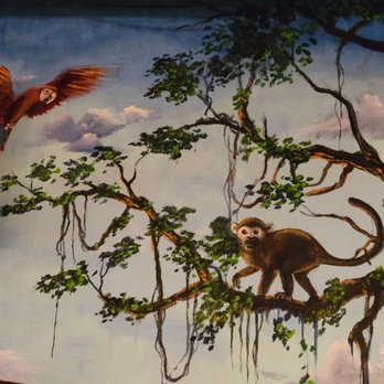 Maya Palenque - a painting of a monkey in a tree - Mexican Near Me - Novato, California