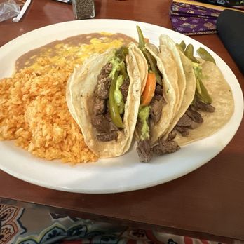 Olivia's Mexican Restaurant - 3 Carne asada tacos with rice and refried beans - Mexican Near Me - Riverside, California Olivia's Mexican Restaurant - 3 Carne asada tacos with rice and refried beans - Mexican Near Me - Riverside, California
