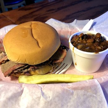 Papa C's BBQ Bar & Grill - Brisket Sandwich (1/2 lb) with Baked Beans - Mmm! - Barbeque Near Me - Paola, Kansas Papa C's BBQ Bar & Grill - Brisket Sandwich (1/2 lb) with Baked Beans - Mmm! - Barbeque Near Me - Paola, Kansas