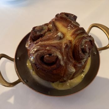 The Village Pub - Warm Cinnamon Roll with Passion Fruit Frosting - Pubs Near Me - Woodside, California The Village Pub - Warm Cinnamon Roll with Passion Fruit Frosting - Pubs Near Me - Woodside, California