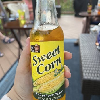 Rocket Fizz - a person holding a bottle of sweet corn - Candy Stores Near Me - Ann Arbor, Michigan