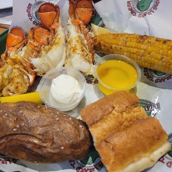Winking Lizard Tavern - Twin Lobster Tails, Baked Potatoes, Cheesy Garlic Bread, and Street Corn - American Near Me - Bedford Heights, Ohio Winking Lizard Tavern - Twin Lobster Tails, Baked Potatoes, Cheesy Garlic Bread, and Street Corn - American Near Me - Bedford Heights, Ohio
